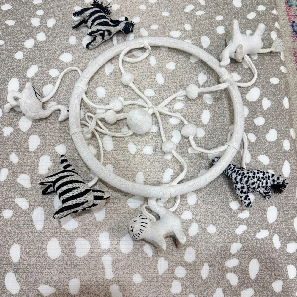 Crate & Barrel Baby Nursery safari animals mobile crib decor newborn neutral